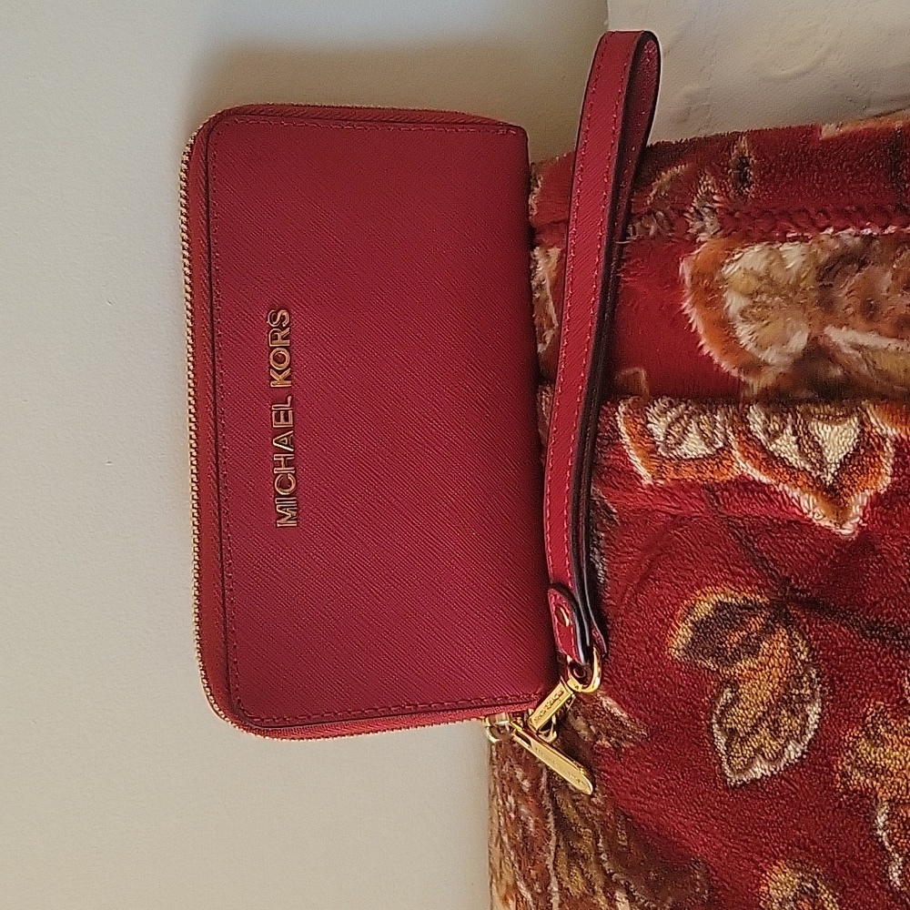 Michael kors Jet Set travel continental red leather wallet.  And also a wristlet
